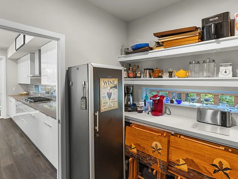 Baker's dream butler's pantry with wine fridge
