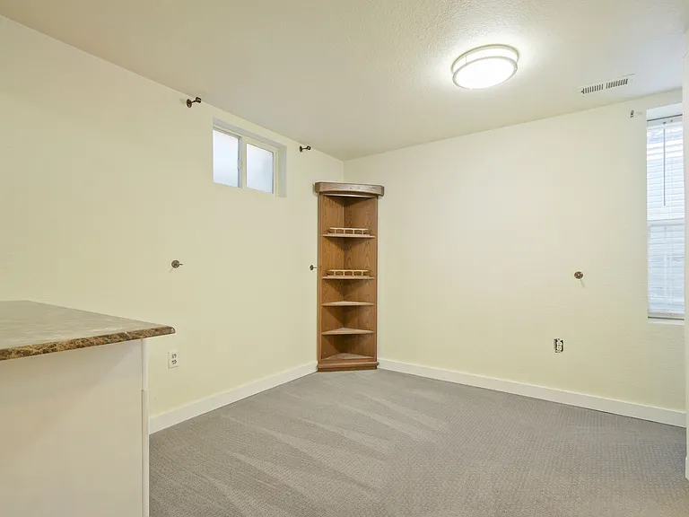 7079 S Curtice St #BASEMENT — Photo 9