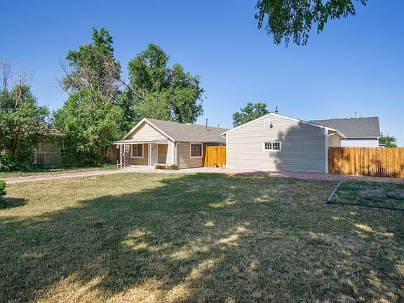 Large front yard is elevated 5 feet from the street and gives a very private feeling.