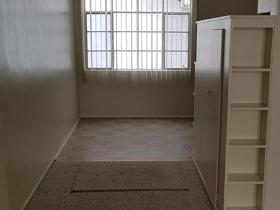 Looking into the left part of the kitchen from the living ro