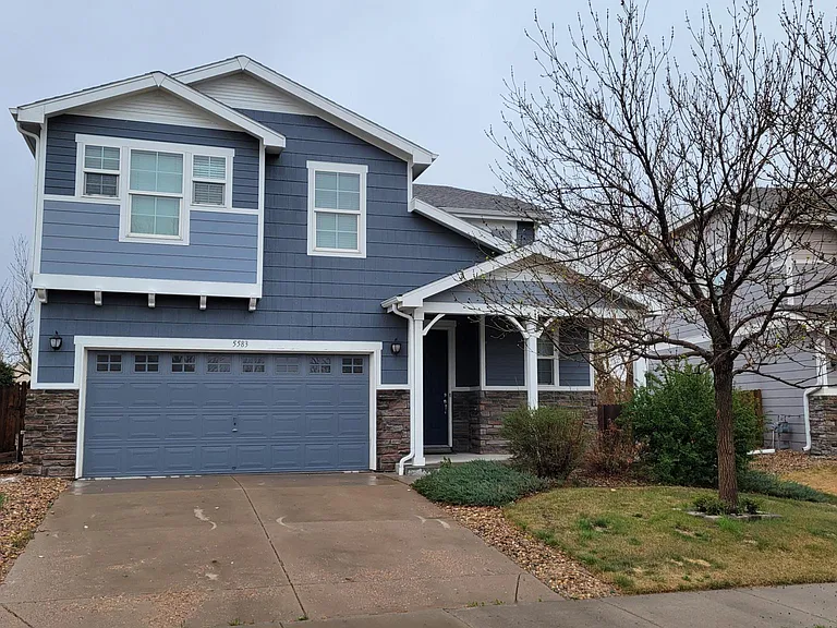 Beautiful 2-Story includes sprinkler system.