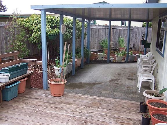 Covered patio in back.