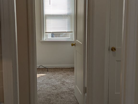 one first floor bedroom with new carpet