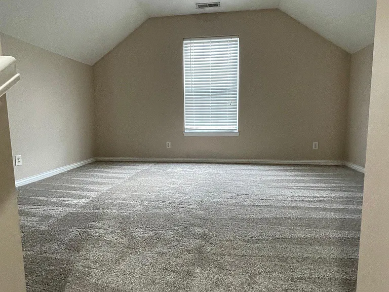 Bonus room at top of stairs