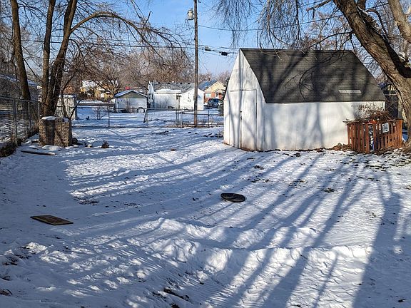 large backyard with large shed
