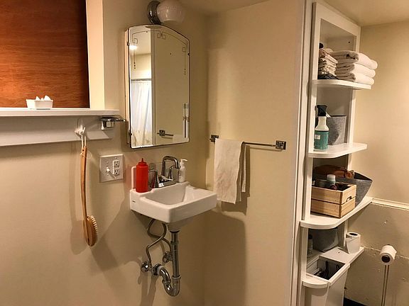 Bathroom with built in shelving