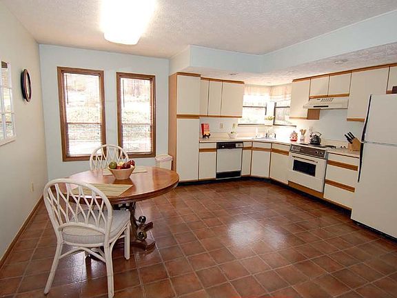 Oversized kitchen with tons of cabinet & counter space & tile floor!