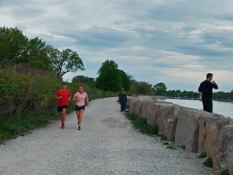Footpath facing north along the lakefront and Golf Course.