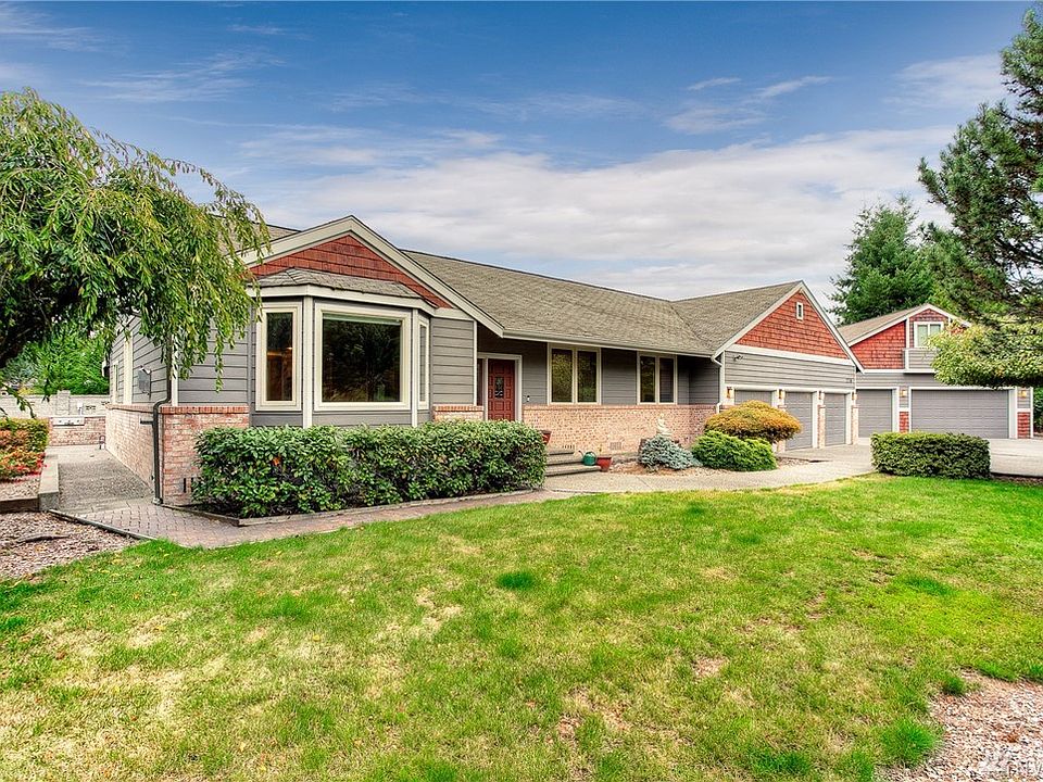 Yearning for space?...welcome to this gated 8.7 acre Edgewood property boasting a spacious updated rambler and multiple outbuildings.