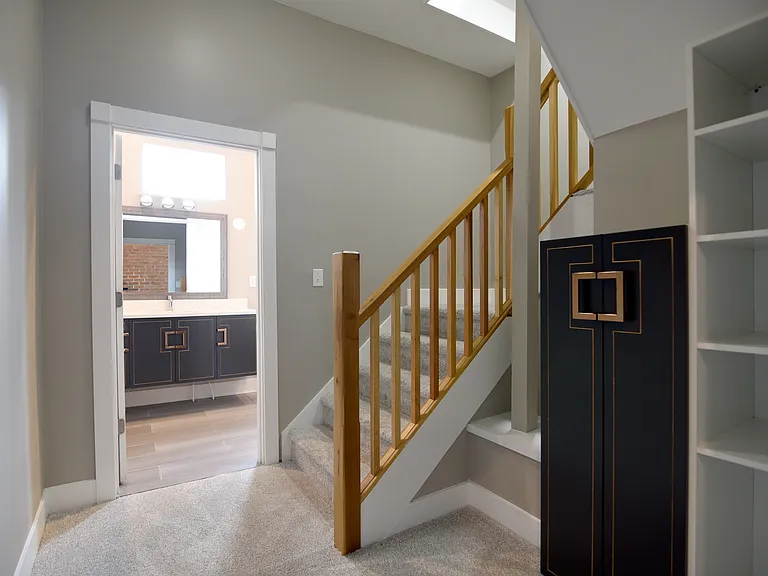 Exquisite new custom designed stairs lead to owners sanctuary!