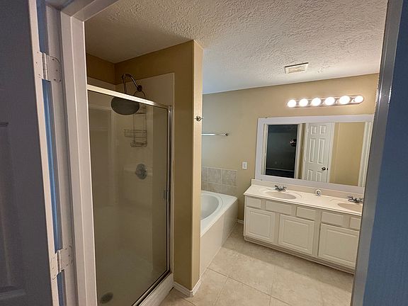 Master Bathroom, shower and separate garden tub, dual sink vanity