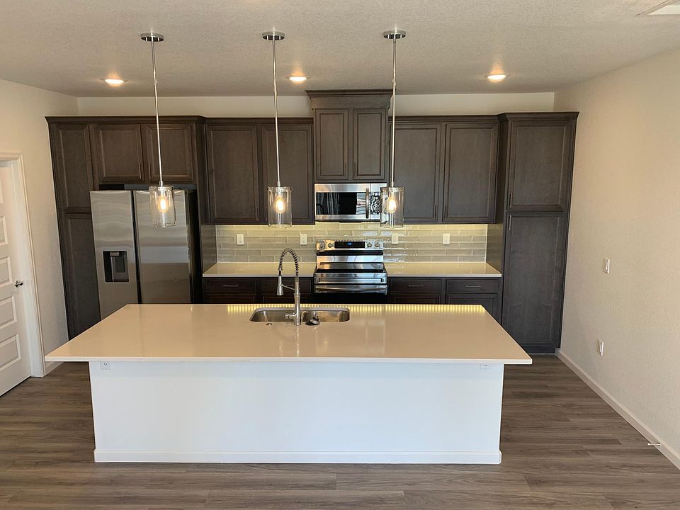 Large 9' island with pendant lights