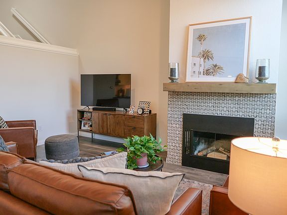 Alternate angle of living room with gas fireplace