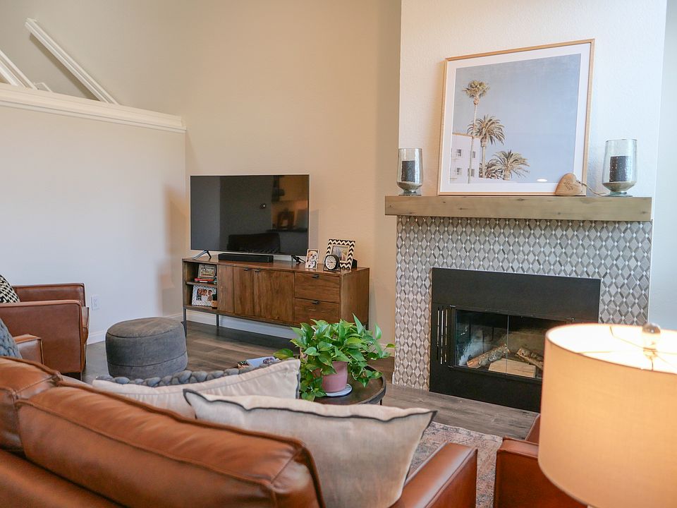 Alternate angle of living room with gas fireplace