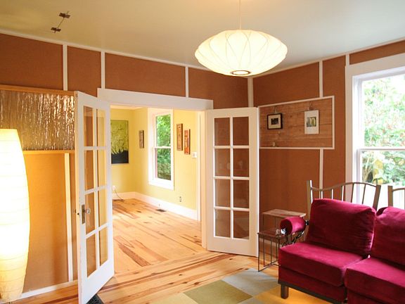 2nd BD has cork walls and the floor has inlaid FLOR carpet tiles