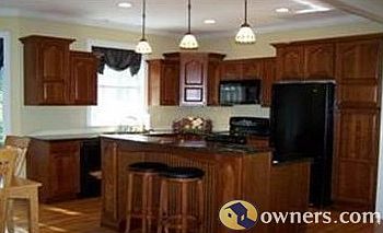 Beautiful kitchen with cherry cabinets and granite countertops
