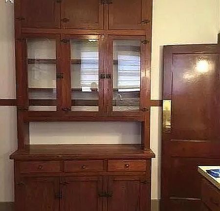 Original, built-in cabinets in kitchen