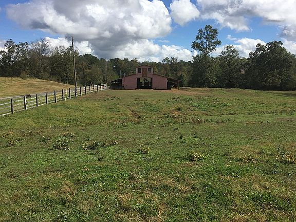 Large pink barn, was Red