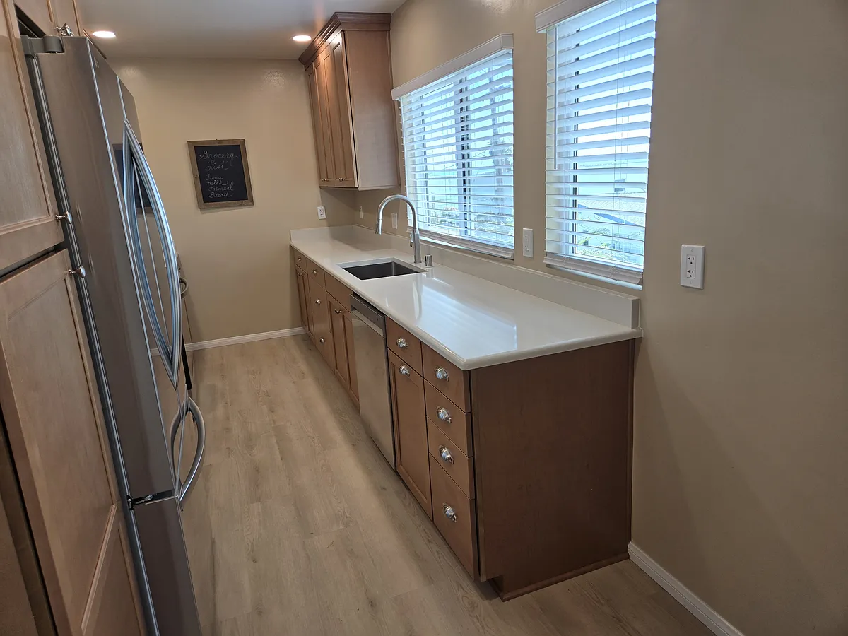 Spacious kitchen with lots of cabinet space and ocean views. - 4930 Dixie Dr