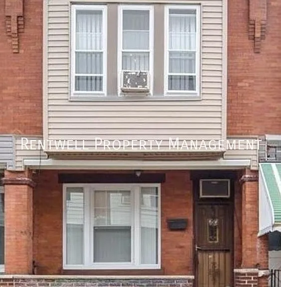 1529 S Newkirk St — Photo 1