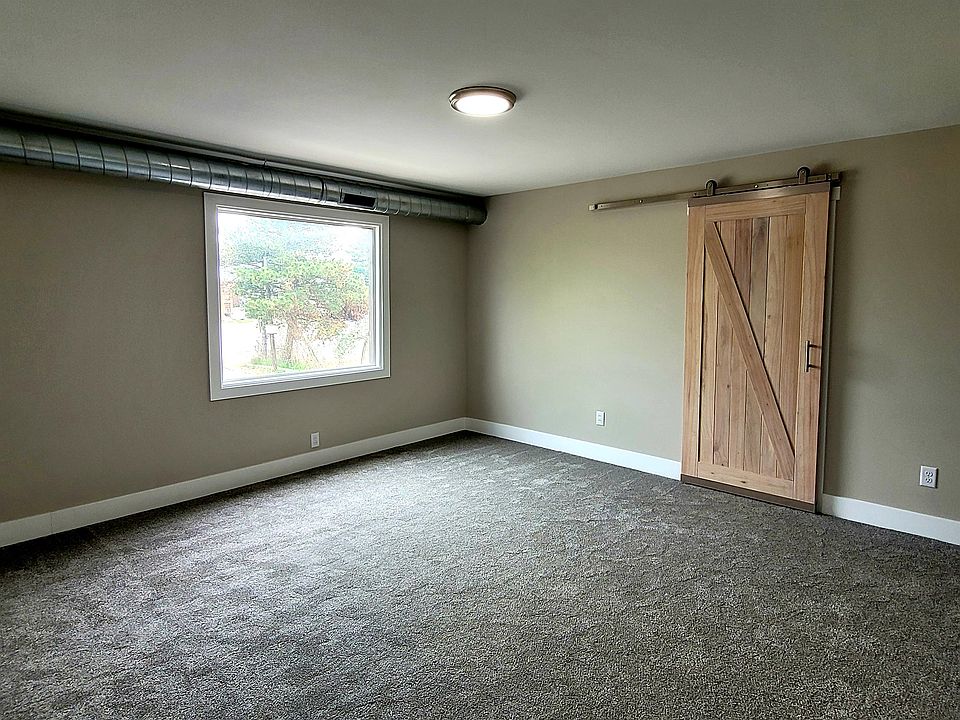 Living room with laundry room access