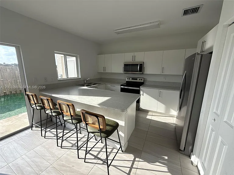 412 NW 12th Pl — Photo 1