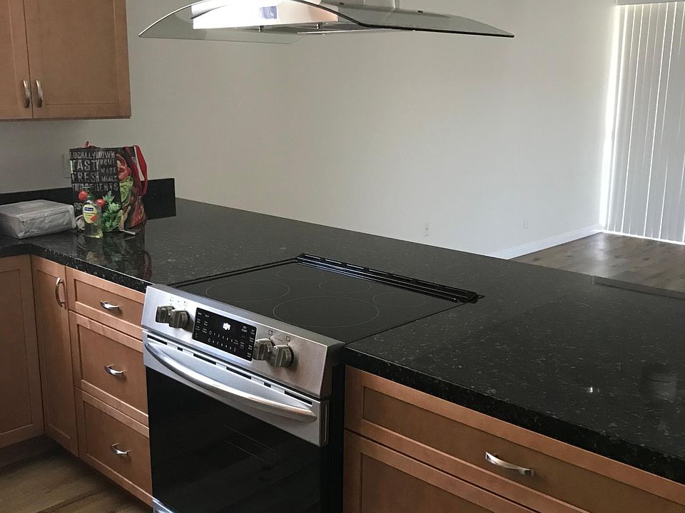 Kitchen counter looking at living room