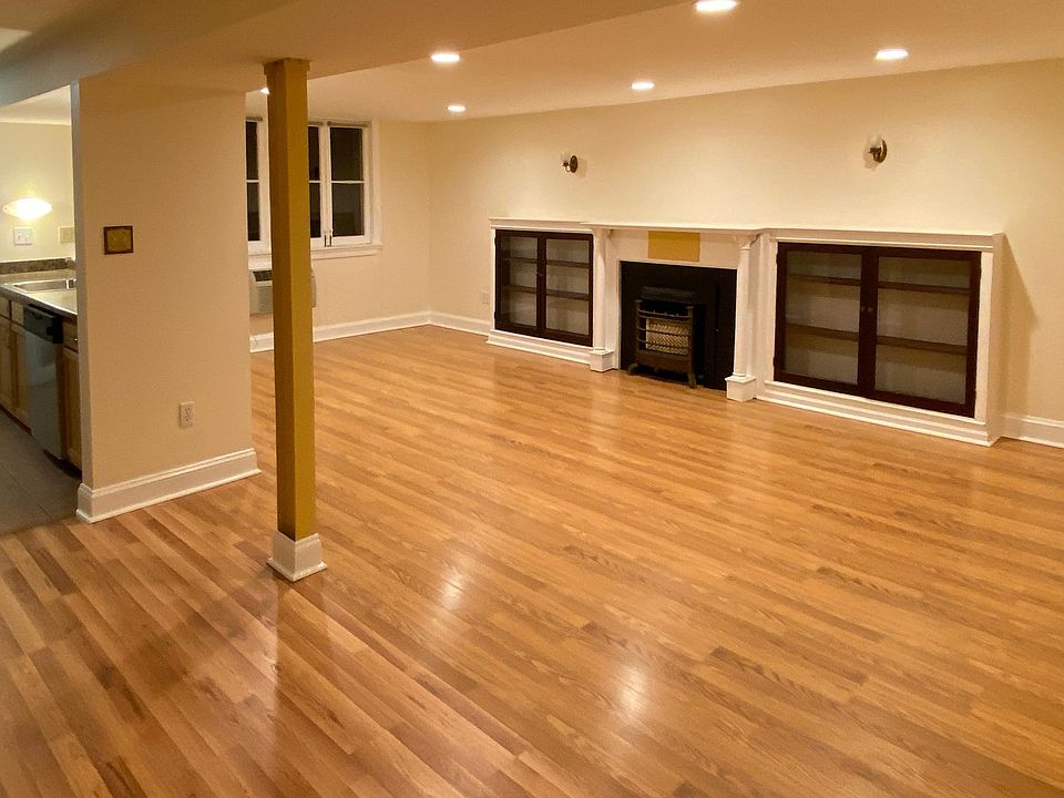 Historic built-in book shelves and non-working fire insert.