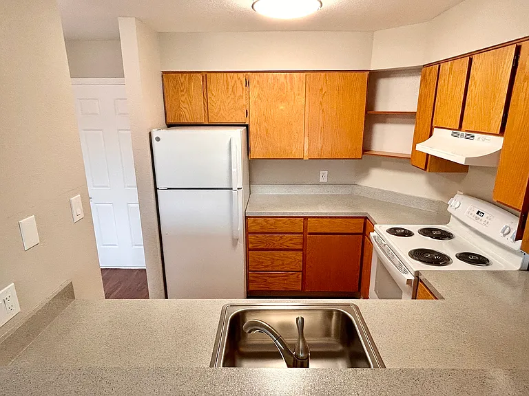 Experience culinary delights in this inviting kitchen space, designed for modern living. Experience culinary delights in this inviting kitchen space, designed for modern living.