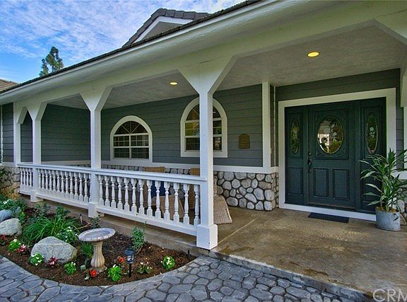 Cobblestone pathway leads "Home!"