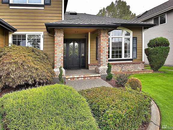 Curb appeal, sprinkler system front and back. 
