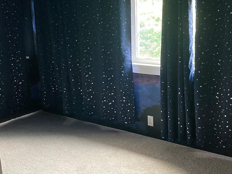 Back bedroom, enclosed sleeping "porch." Fits a queen bed in either direction. (Back bedroom main photo to be uploaded after painting)