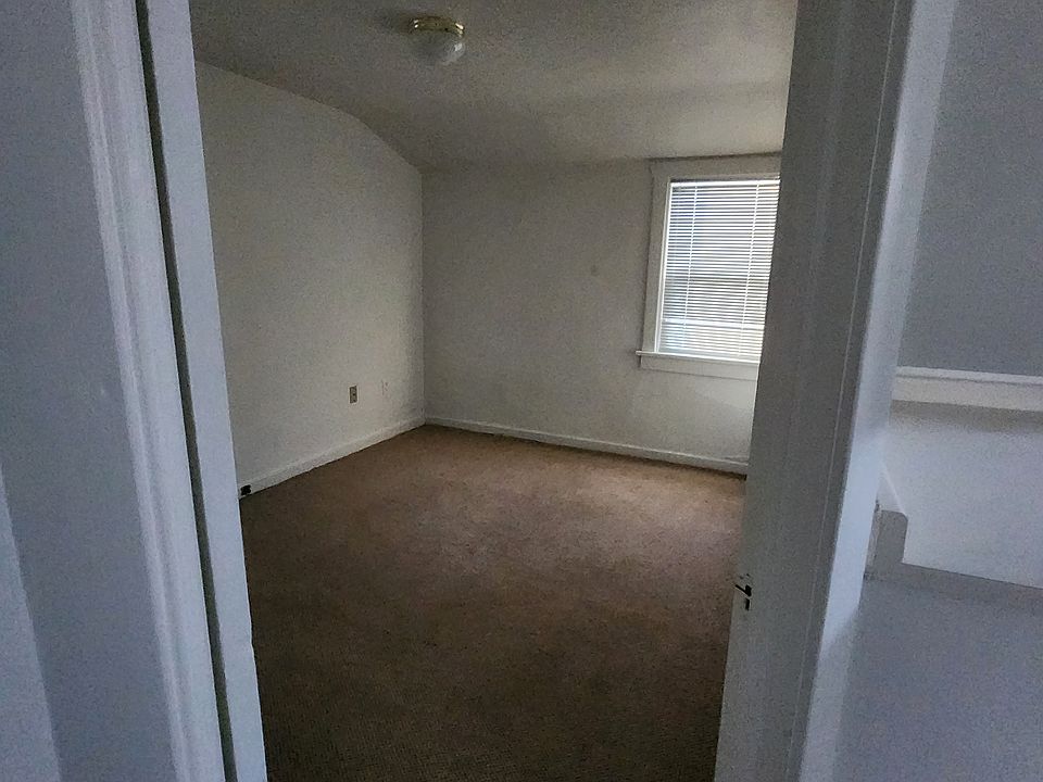Bedroom with a closet and one window looking to the south.
Large cottonwoods keep it cool in summer.