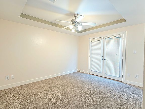 1st Floor bedroom, view towards patio door.