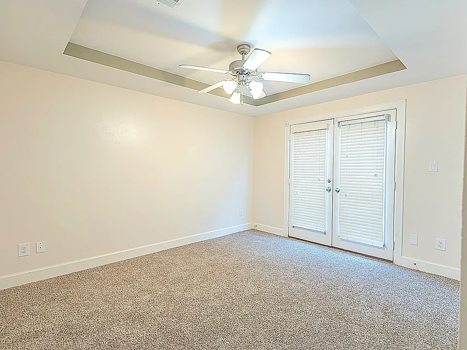 1st Floor bedroom, view towards patio door.