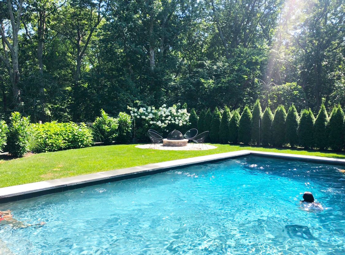  fully fenced backyard with fire pit