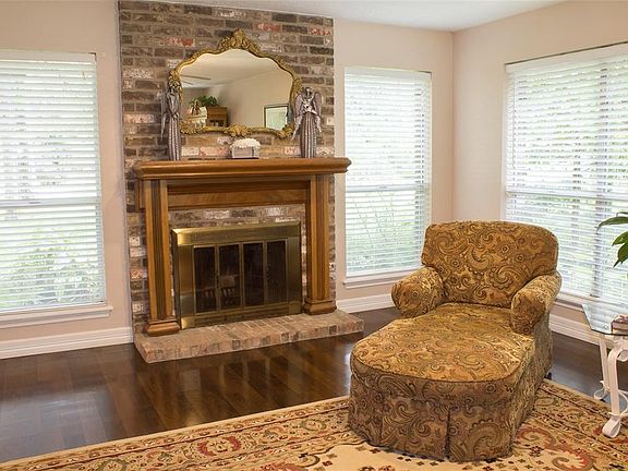 Bright and Beautiful Family Room with a Fire Place