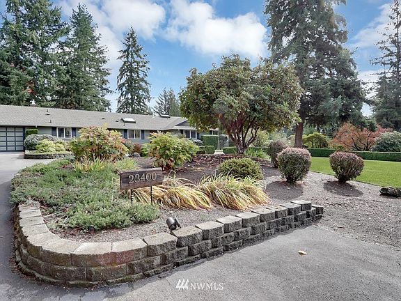Beautiful landscaping complete with a sprinkler system.