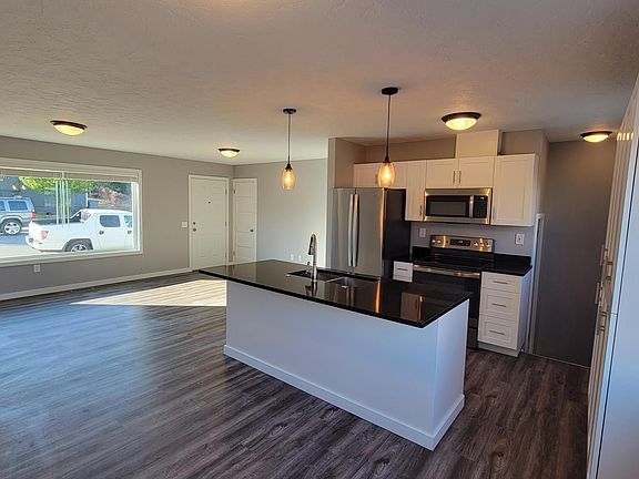 A view of the kitchen and living room.