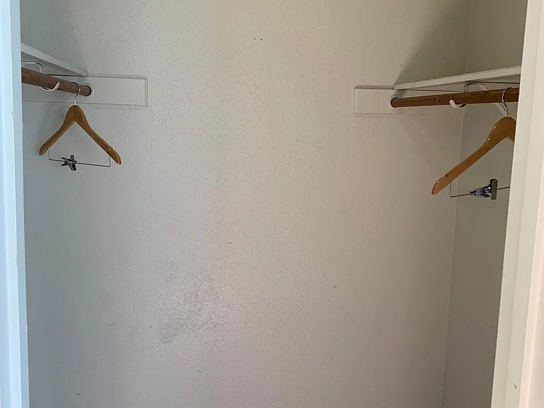 Bedroom one walk in closet.