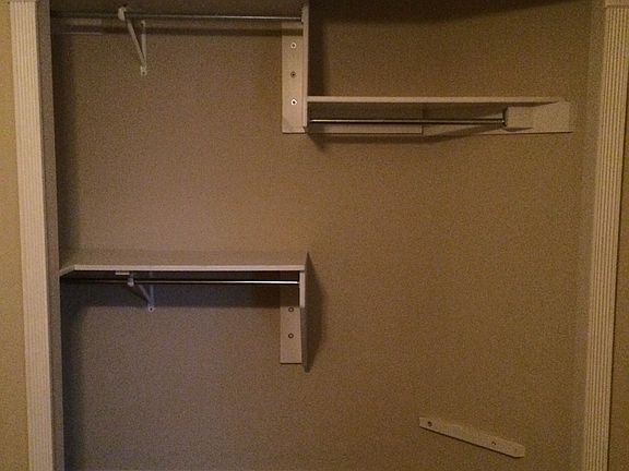 Custom built 3 tier closets in 2 guest bedrooms