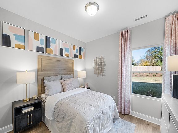 A downstairs bedroom and bathroom provides a secluded area for guests.