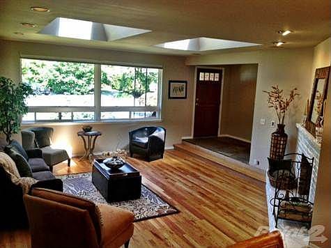 Slate Tiled Entryway and Gorgeous Hardwoods