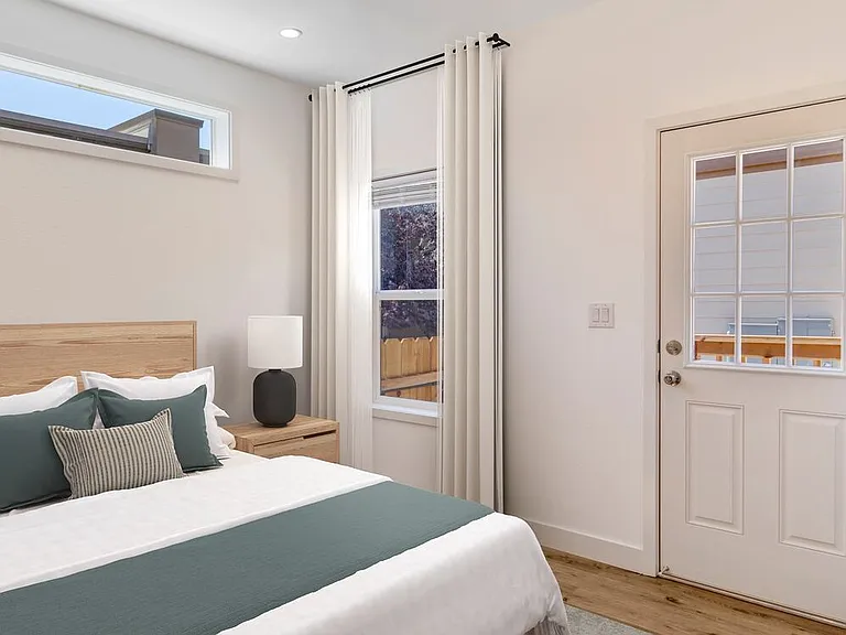 Freestanding Home bedroom with hard surface flooring