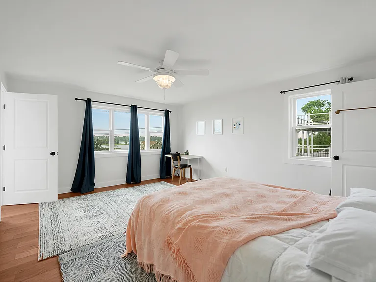 Master Bedroom with Master bathroom, and 2 closets, with back door egress on first floor