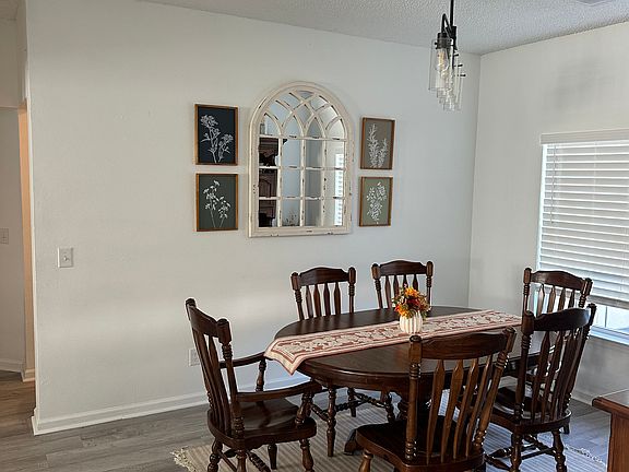 Dining Room with Table and Chairs