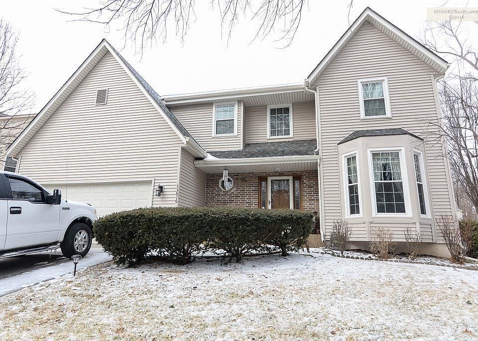 Inviting front porch, all siding,windows and driveway have been replaced.