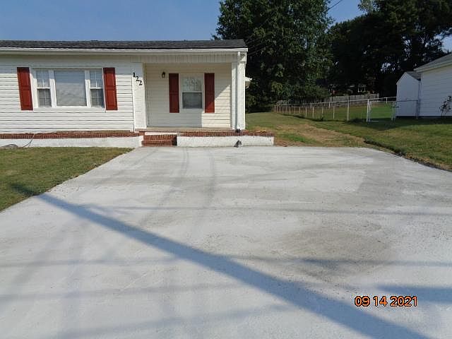 122 Unit Main Entrance, Driveway - Parking