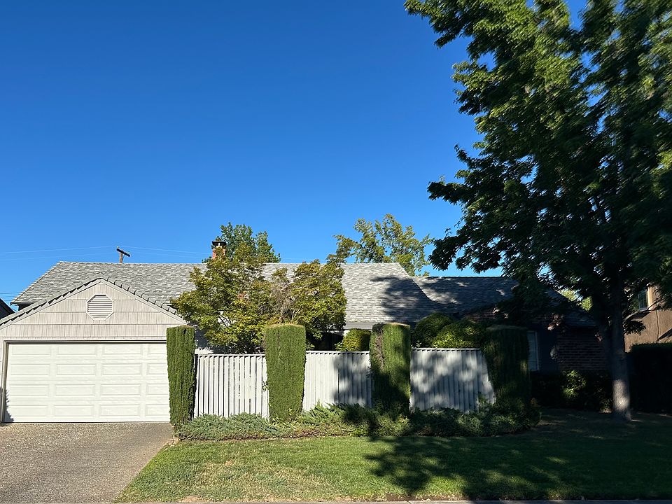 Large two car garage with driveway for additional parking