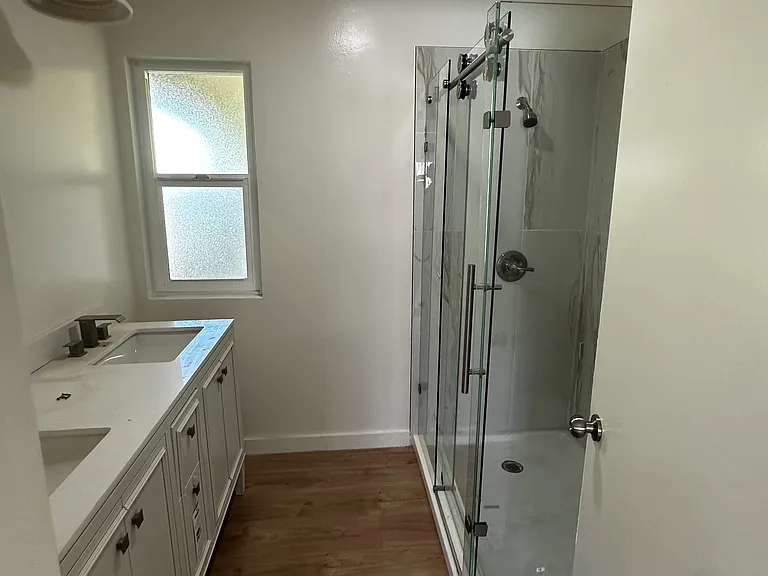 Master Bath with New Double Sink Vanity, Large Shower, New Toilet. Early picture without New Vanity lights and Mirrors